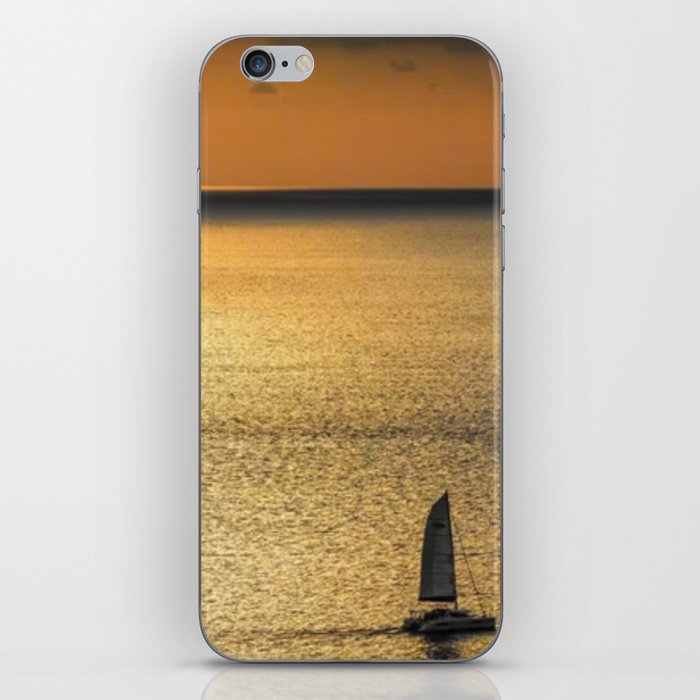 Sunset view of calm ocean iPhone Skin