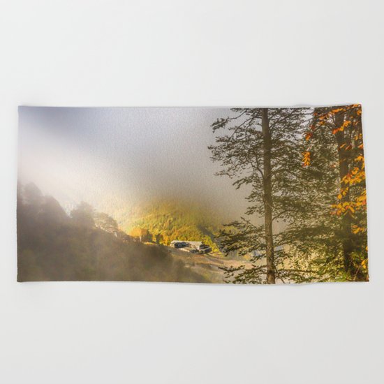 Mountains in the mist Beach Towel