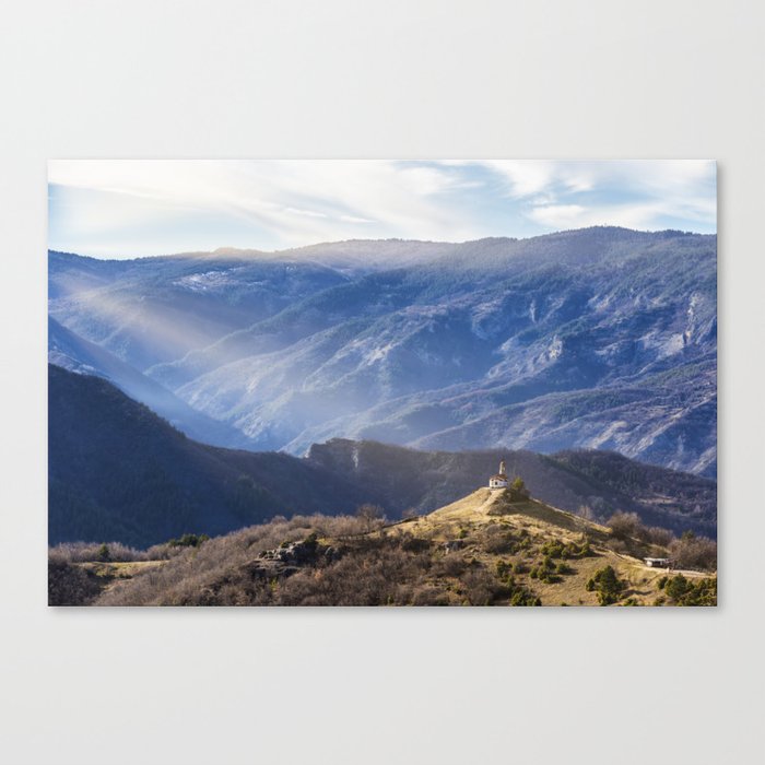 Small chapel in the mountains. Canvas Print