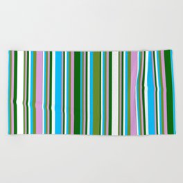 [ Thumbnail: Green, Plum, Dark Green, White & Deep Sky Blue Colored Stripes Pattern Beach Towel ]
