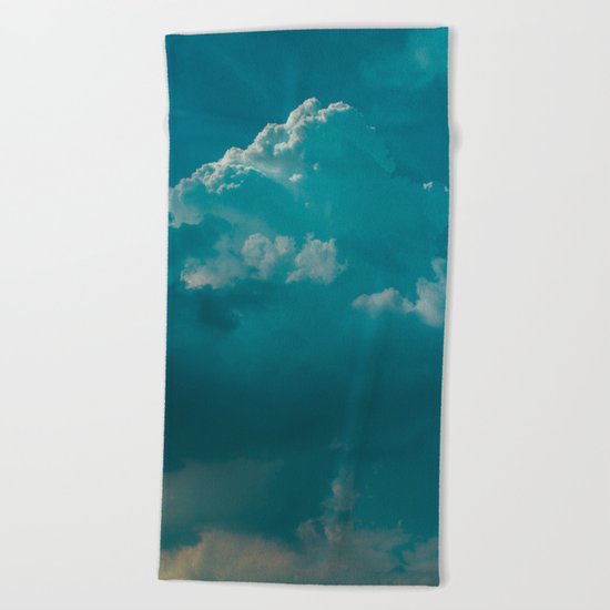 up in the clouds Beach Towel