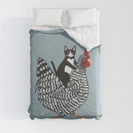 Tuxedo Cat Riding a Chicken Comforter