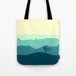 Mountain Biker cycling in the mountains  Tote Bag