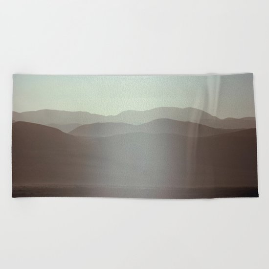 by chance Beach Towel