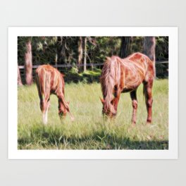 Horses feeding in a field Art Print
