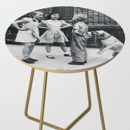 Boys ain't the brightest bulbs in the pack; unsuspecting boy flirting with girls gets his ice cream eaten by smart canine dog funny humorous black and white vintage photograph - photography - photographs Side Table