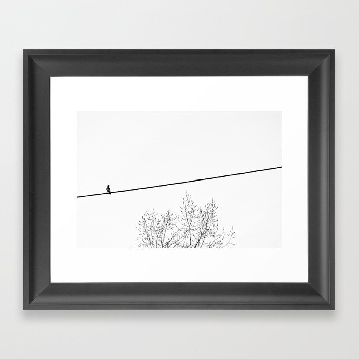 Bird on wire Framed Art Print