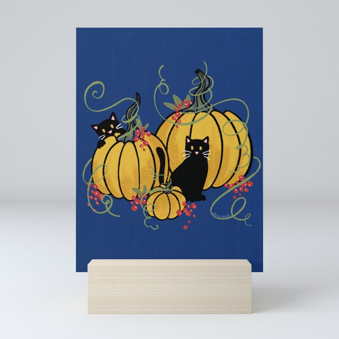 Black cats and pumpkins in October Mini Art Print