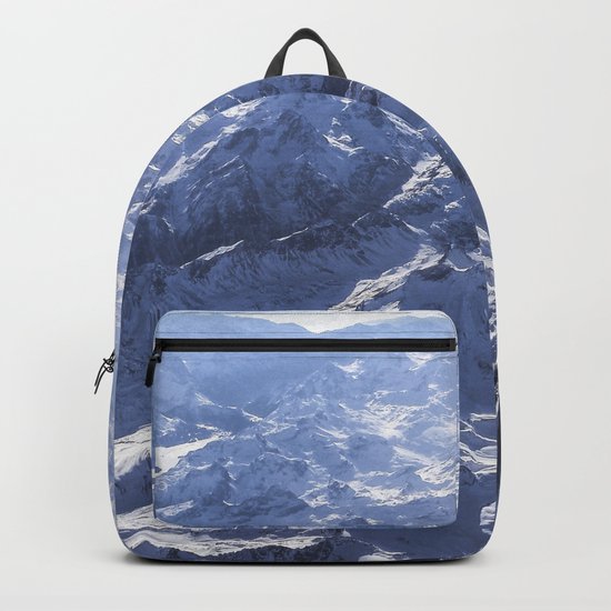 White mountains with snow winter nature Backpack