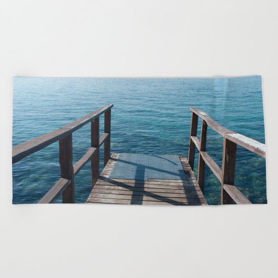 Into the sea Beach Towel