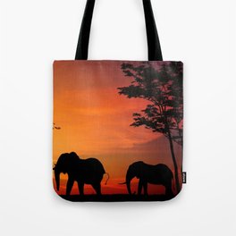 Elephants in the African sunset Tote Bag