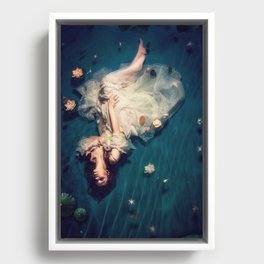 Dreamland and flowers in lily pond; female in white gown floating magical realism fantasy female portrait color photograph / photography Framed Canvas