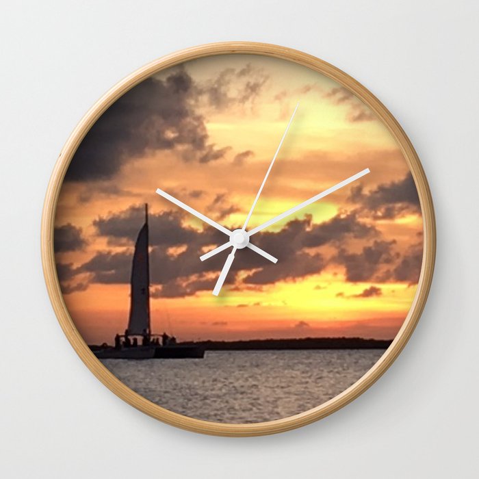 Key West sailing into Sunset Wall Clock