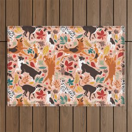 Autumn paw-fection // flesh coral background dogs jumping and dancing with many leaves in fall colors Outdoor Rug