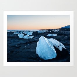 Icebergs on a black sand beach at sunset in Iceland Art Print