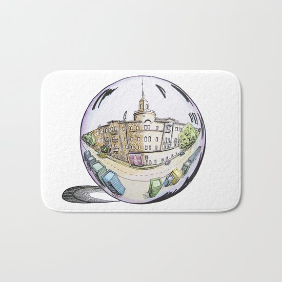 the city painted in pastel colours and in a bowl Bath Mat