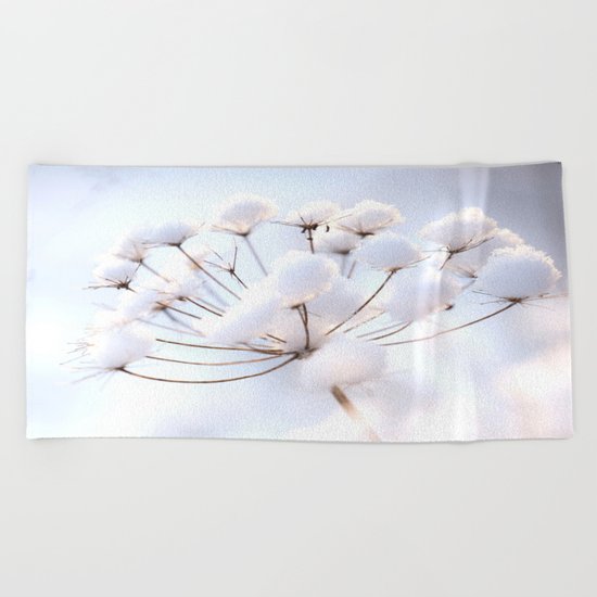 Snow covered dryflower Beach Towel