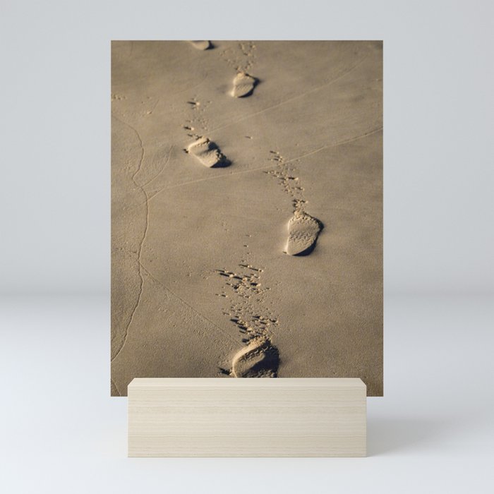 Footsteps in the sand Mini Art Print