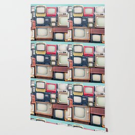 Retro TV receivers set from circa 60s, 70s and 80s of XX century, old wooden television stand with amplifier front mint blue wall background. Broadcasting, news concept. Vintage style filtered photo Wallpaper