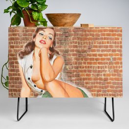 Vintage Pin Up Girl With Two Vinyls, A Green Skirt And Red Nails On A Wall Background Credenza
