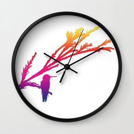 Hummingbird silhouette in rainbow colors Wall Clock
