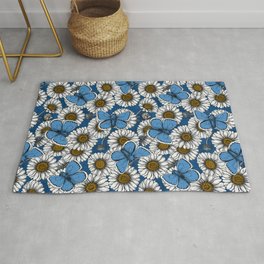   Daisies and butterflies on a classic blue background Rug