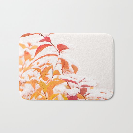 Snow covered red leaves Bath Mat