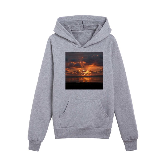 Coastal beach sunset and rays of twilight sun nature color photograph / photography Kids Pullover Hoodie