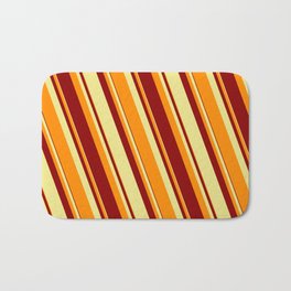 [ Thumbnail: Tan, Dark Orange, and Dark Red Colored Lined Pattern Bath Mat ]