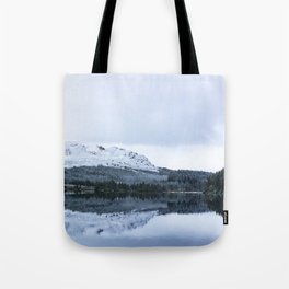 Reflection on loch Farr Tote Bag