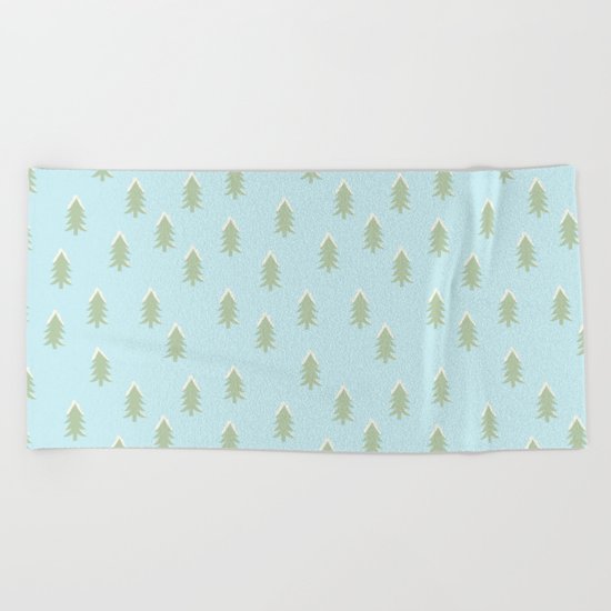 Merry christmas- With snow covered x-mas trees pattern on aqua backround Beach Towel
