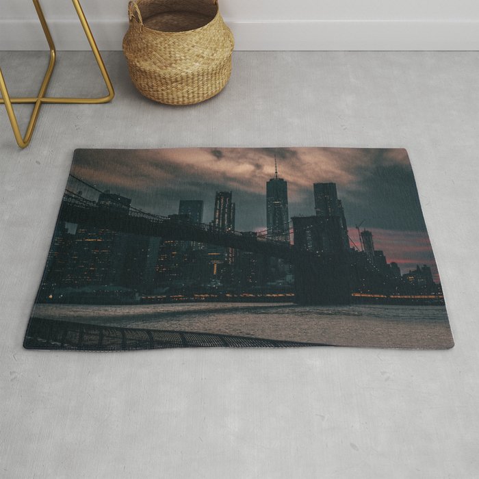 Brooklyn Bridge and Manhattan skyline at night in New York City Rug