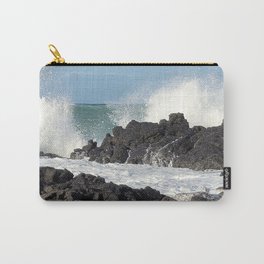 The waves of the Jeju sea crashing on the rocks , Jeju Island, Korea. Carry-All Pouch