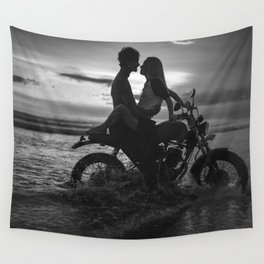 The motorcyclists; lovers at sunset on vintage motorcycle coastal beach romantic portrait black and white photograph - photography - photographs by Yuliya Kirayonak Wall Tapestry