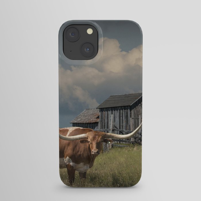 Longhorn Steer in a Prairie pasture by 1880 Town with Windmill and Old Gray Wooden Barn iPhone Case