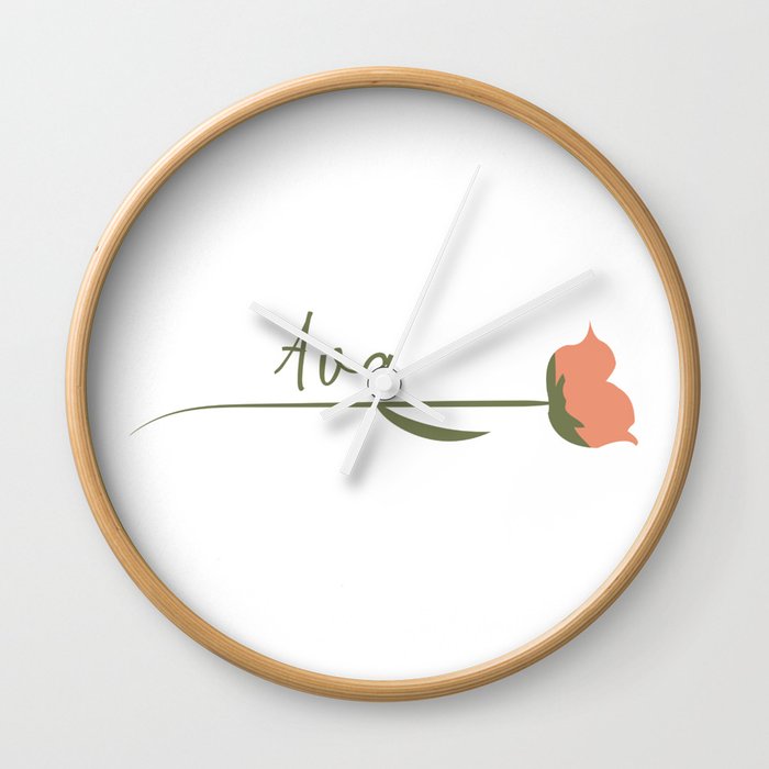 Ava name on a rose Wall Clock