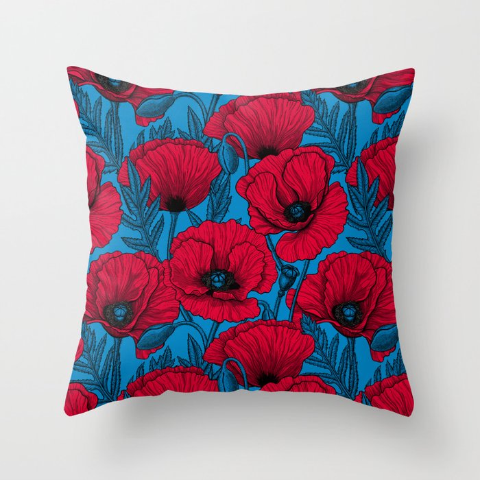 Red poppy garden on blue Throw Pillow
