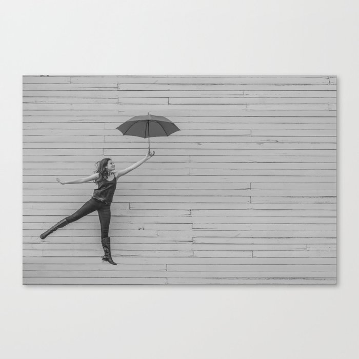 On the way to the break of day; woman flying with umbrella confidence inspirational female black and white photograph - photography - photographs Canvas Print
