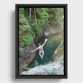 jumping into waterfall Framed Canvas