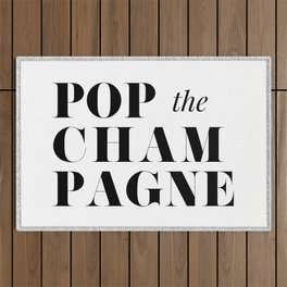 Pop the Champagne Outdoor Rug