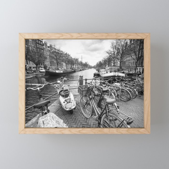 Bicycles and scooter parked next to Amsterdam canal Framed Mini Art Print
