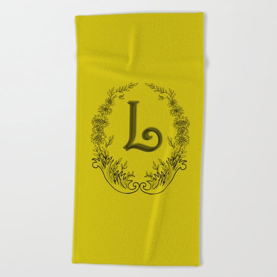 the letter L in a leaves and flowers Beach Towel