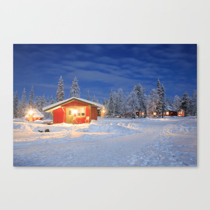 Holiday Home in Winter Landscape at Lapland Canvas Print