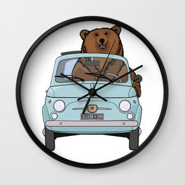 A smiling bear driving a small light blue car Wall Clock