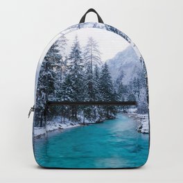 Magical river in enchanted winter forest Backpack