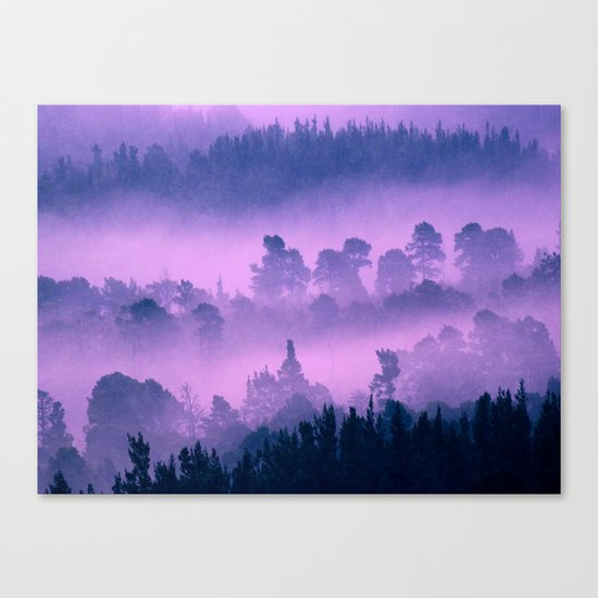 Blue forest in a pink fog Canvas Print