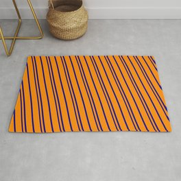 [ Thumbnail: Dark Orange & Dark Blue Colored Pattern of Stripes Rug ]