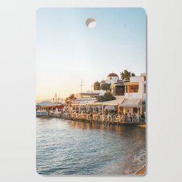 Sunset over Greek Tavern on the Seaside | Sunset Travel Photography on Mykonos, Greece | Summer Vibes Cutting Board