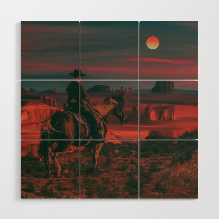 A cowboy in the background of a Texas sunset. Wood Wall Art
