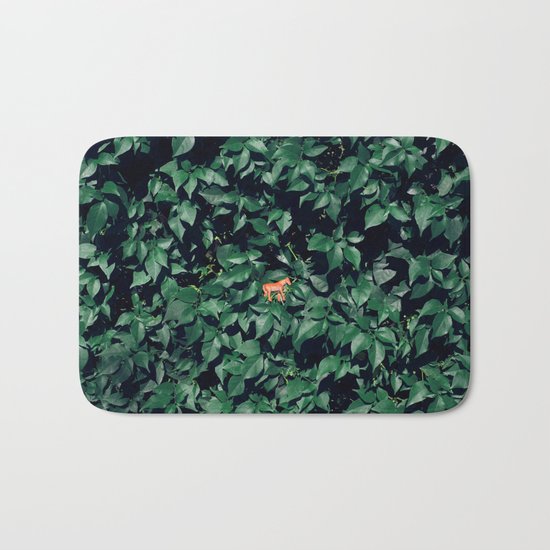 Orange horse in the bush Bath Mat